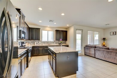 Kitchen with light tile patterned floors, visible