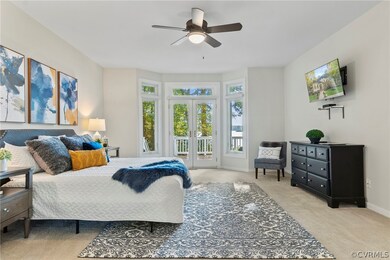 Primary bedroom. Waterviews, deck access.