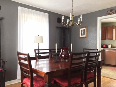 Formal Dining room with gorgeous original hardwood