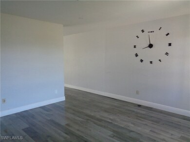 Living Room leading into the Kitchen