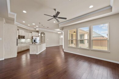 Living Room overlooking into Open Concept Kitchen