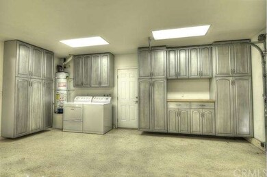 Over $10,000 in cabinets, epoxy flooring, pull dow