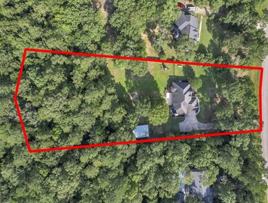 Sitting on approximately 2.3 AC the property exten