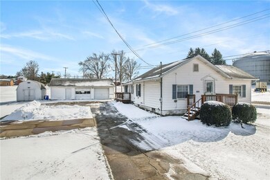 Front, driveway to 2+ car garage