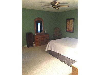 Exterior Front. Large master bedroom with two closets and dressing area.