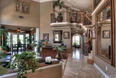 Two-story entry and and dramatic floorplan wows gu