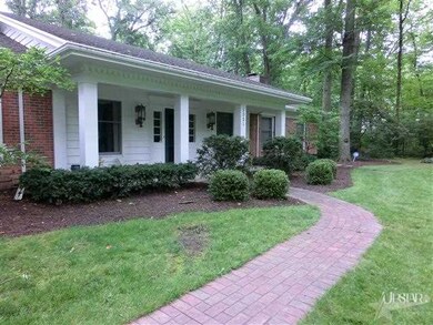 Brick walkway up to this spacious ranch home