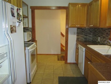 Fridge, Range and Dishwasher included.