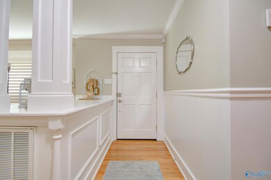7X4 FOYER IS OPEN TO FORMAL DINING ROOM AND GREAT ROOM WITH SOARING CEILINGS.
