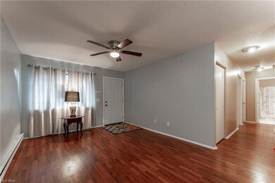 Living area open to the dining room featuring ceil