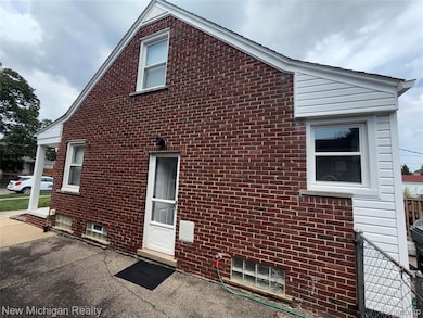 View of home's exterior with brick siding