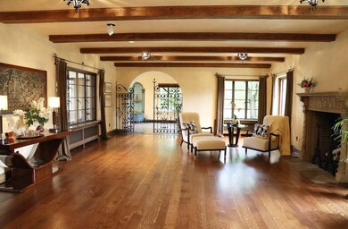 The elegant, ballroom sized living room.