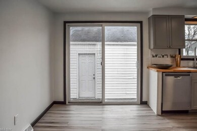 Dining room with sliding doors to the back.