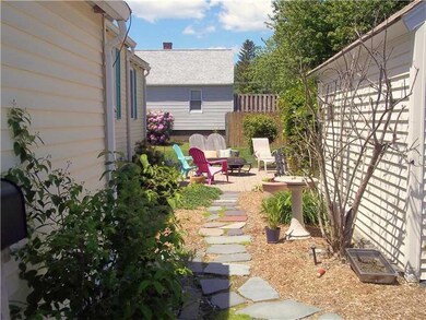 Exterior Back. Large sunny patio...