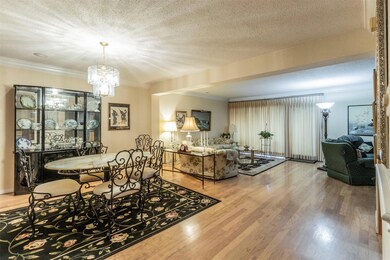 Open concept living and dining with beautiful hard