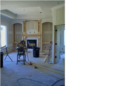 Living/Family room; gas fireplace; book shelves un