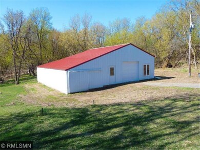 Huge 42x42 pole barn has storage area with overhea
