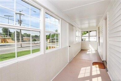 Your front porch!  Put screens in and use it all y