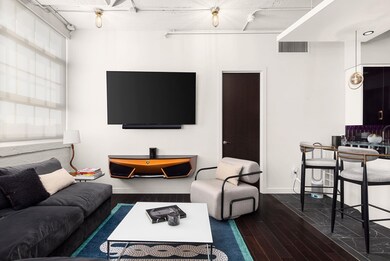 Living room featuring dark hardwood / wood-style f