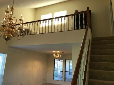 Loft looking up from Living room. Great office space. 