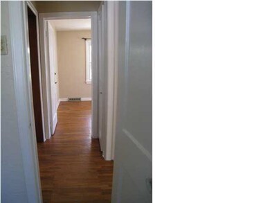 Hallway to the bedrooms and bath.