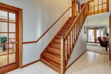 2 sty foyer, to the left is the Formal dining room