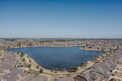 Home is located near a fabulous lake with great walking trail surrounding it. Perfect for a morning jog or walking
the family dog in the evening.