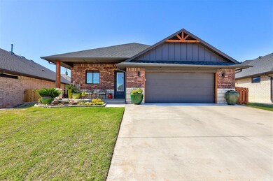 View of front facade featuring a garage and a fron