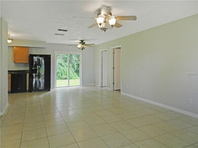 View of dining room and kitchen from living room