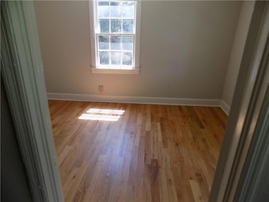 Spare room with light hardwood / wood-style floors