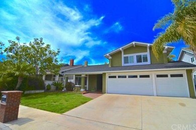 The extra long drive way & three car garage work w