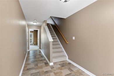 Stairway featuring tile flooring