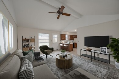 Spacious Den area of home is approx 15x14 (Buyer to verify) and has cathedral ceiling and tile floors. Entire interior of home painted Dec. 2022 (per Seller).  There is also a 2nd living area at front of home. PHOTO VIRTUALLY STAGED.