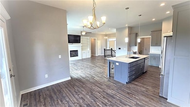 Main level - Dining Room view across kitchen island into family room