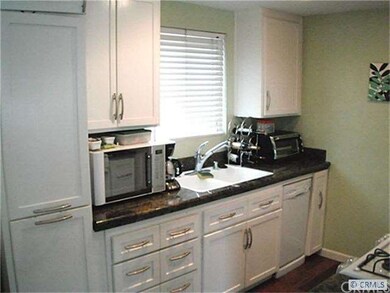 West side view of the kitchen.