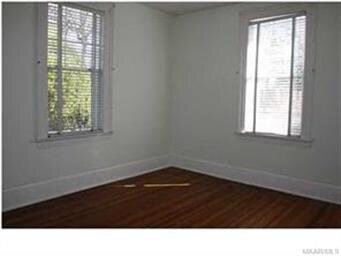Bedroom with hardwood floors