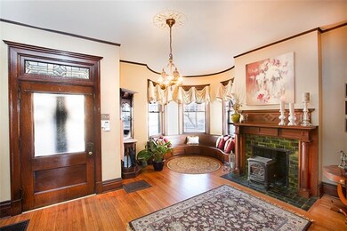 Entrance to formal sitting room.  Gas stove heater