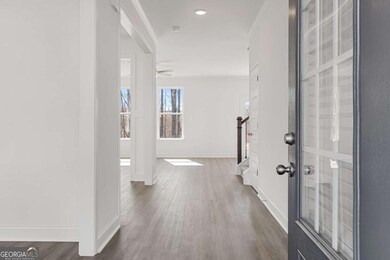 Welcoming foyer with a direct view into the main l