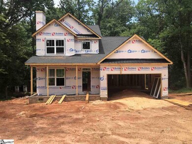 The house sits in the center of a full acre with l