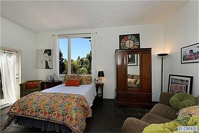downstairs Master Bedroom with seating area
