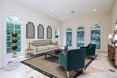 Open entertaining area in front of home with large
