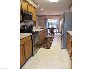 Kitchen with breakfast bar, dinette, stainless ste