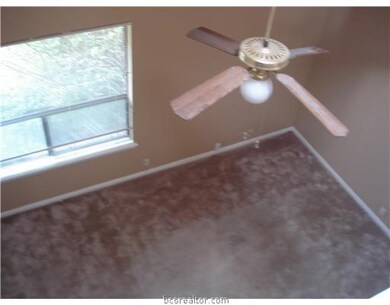 Living Room. View from upstairs looking down into the living room