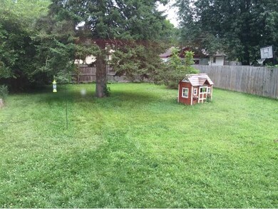 Lots of room to play and entertain in this backyar