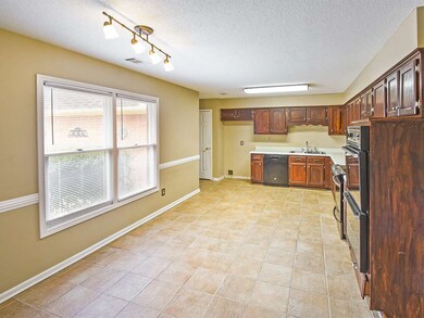Spacious eat-in kitchen that is open to the dining