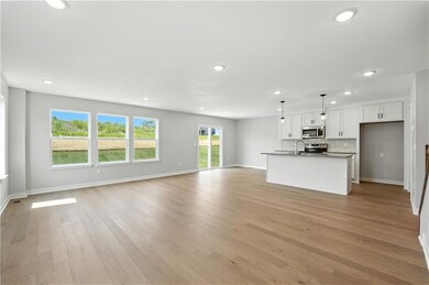 707 SW Glenn Cir, Raymore, MO 64083 - photo 4