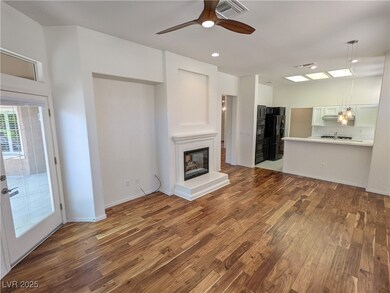Unfurnished living room with dark wood finished fl
