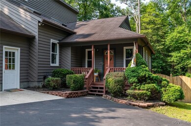 View of front of home featuring covered porch and