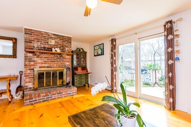Living room with slider to back deck