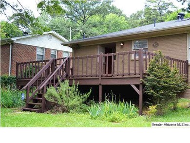 Large deck that overlooks the huge fenced back yar